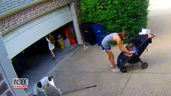 A little girl hanging garage door