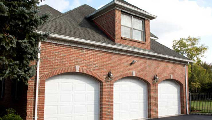 three white garage door image